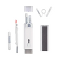 Kit 7 em 1 para limpeza de teclado, fones e celular na cor branca, com ferramentas destacadas.
