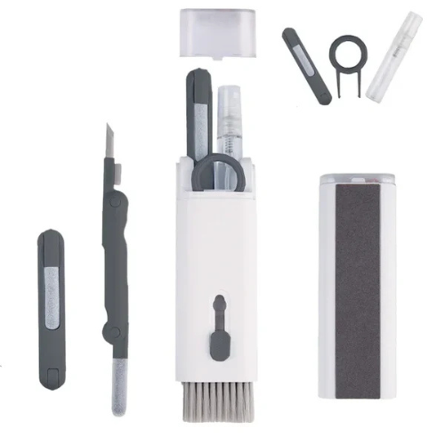 Kit 7 em 1 de escovas de limpeza para teclado, fone e celular na cor cinza, com acessórios multifuncionais.