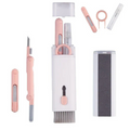 Kit de escovas de limpeza 7 em 1 com design rosa, ideal para acessórios eletrônicos